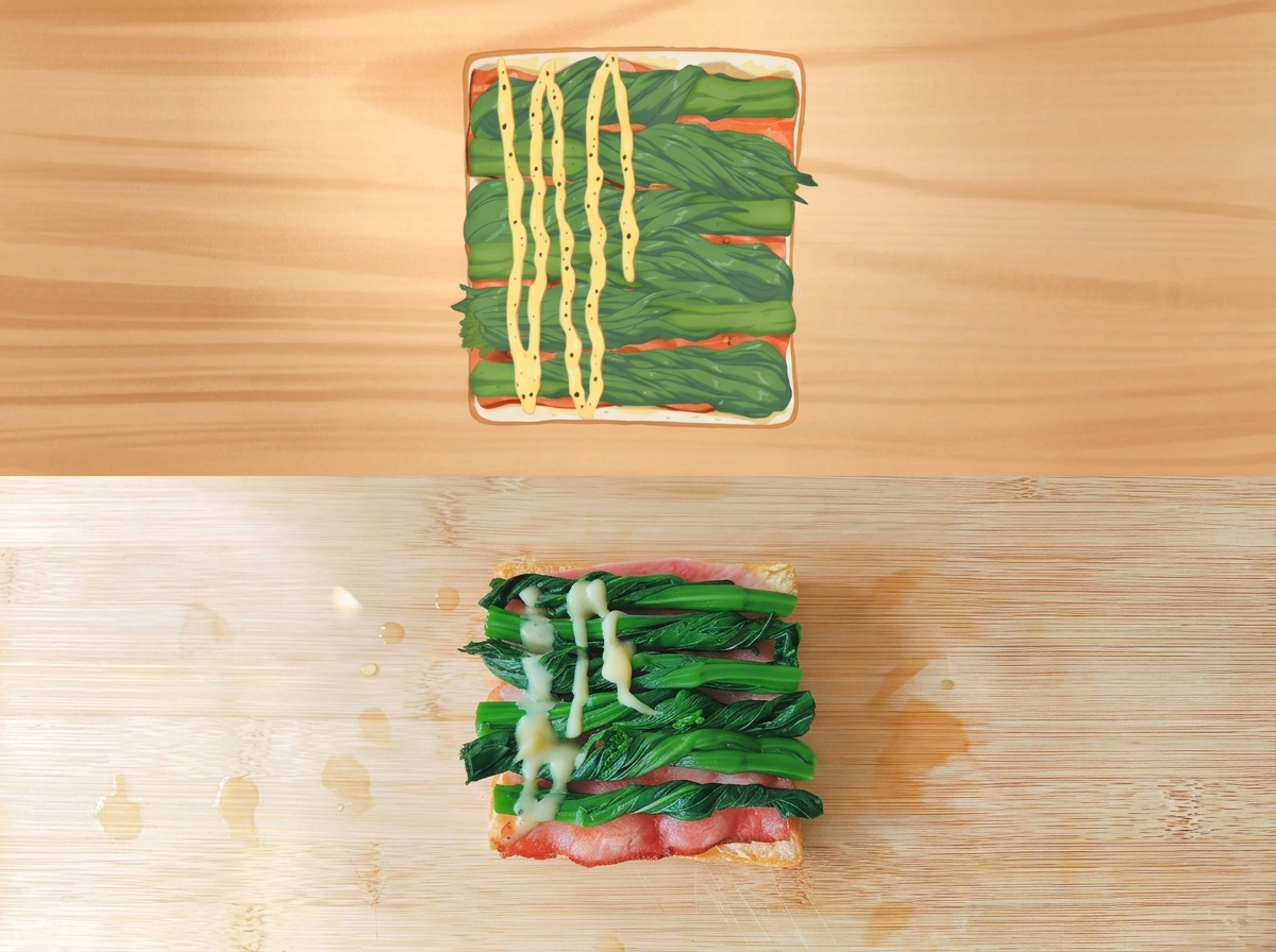 Creamy sauce being drizzled in a zig-zag pattern over a layer of spinach on a sandwich.