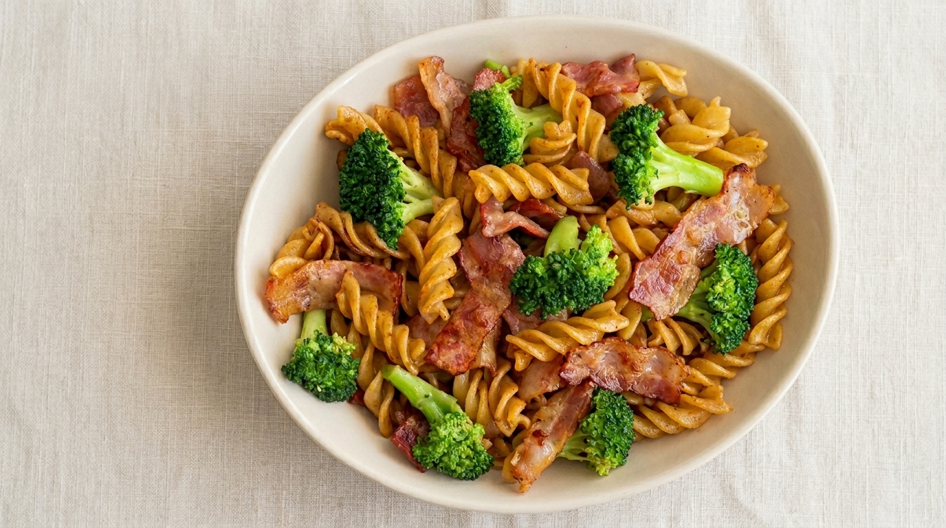 Fusilli pasta tossed with savory bacon, fresh broccoli, and a rich black truffle infusion.