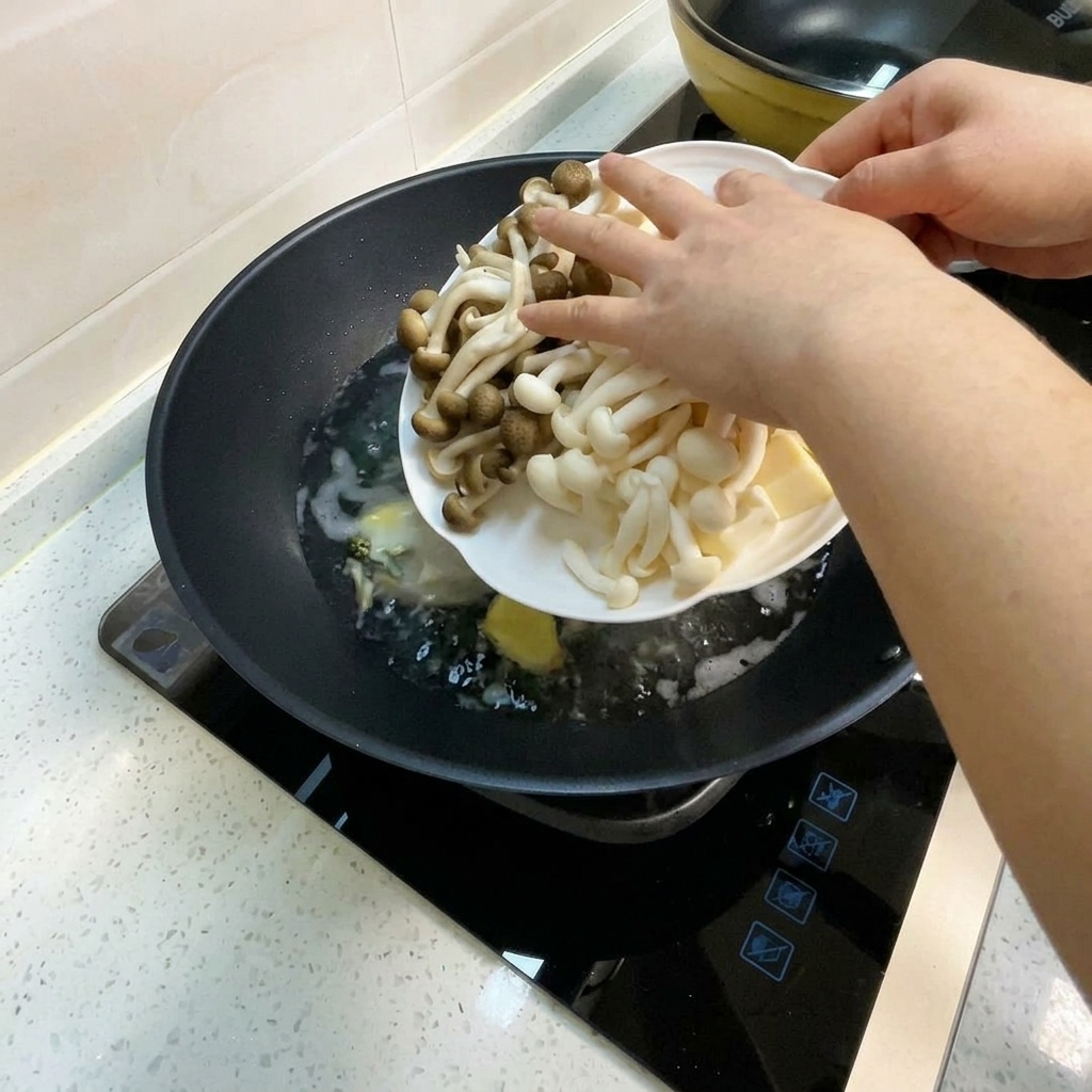 White beech mushrooms, crab-flavored mushrooms, and tofu cubes being added to the simmering soup.