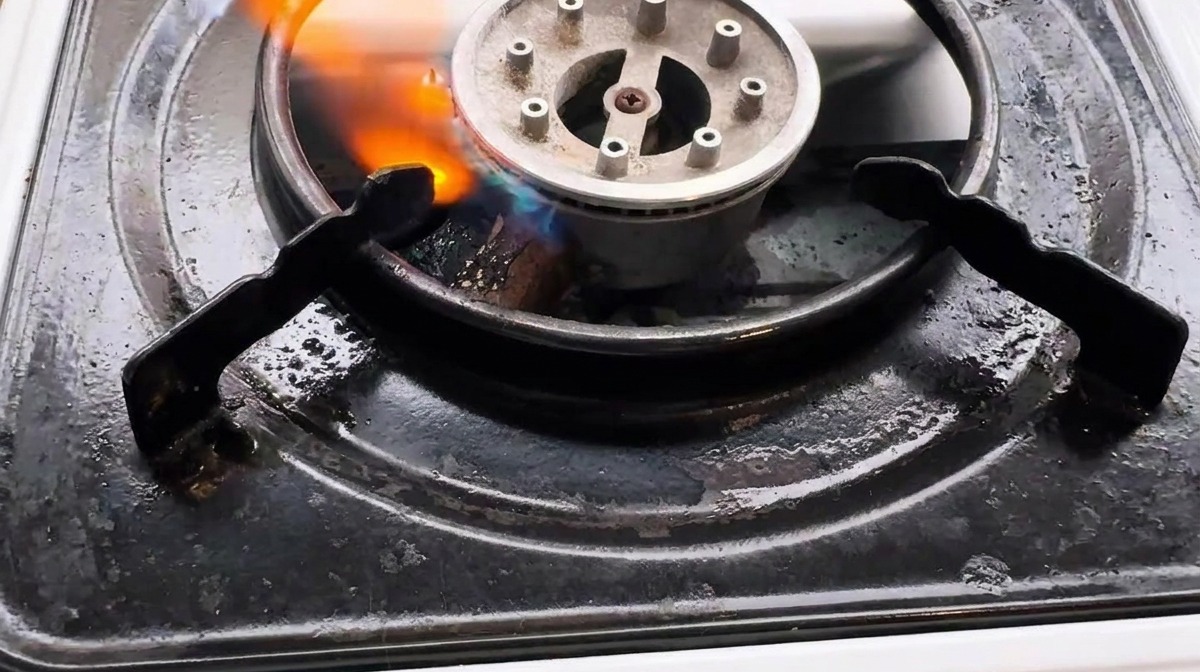 The chili-garlic mixture sizzling in a hot pan with oil, creating a fragrant base for the sauce.
