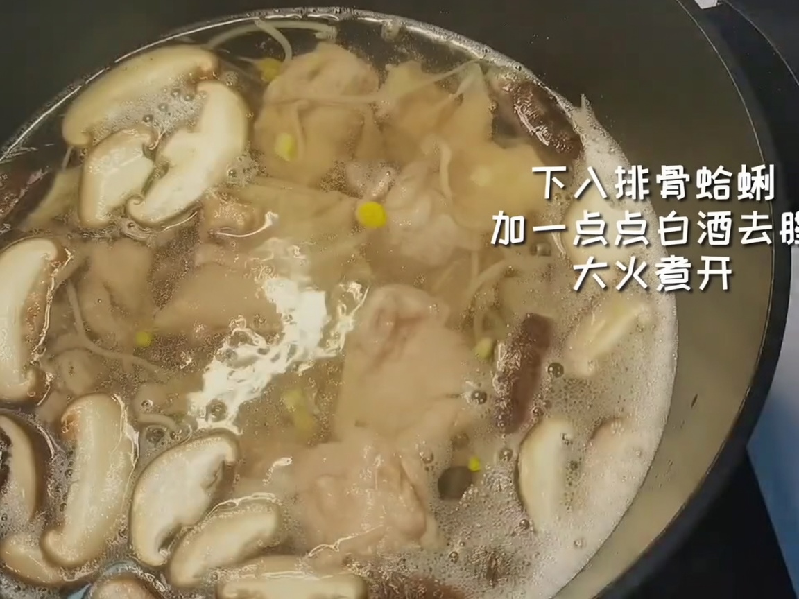 Blanched pork ribs and clean clams being added to a pot with vegetables and boiling water.