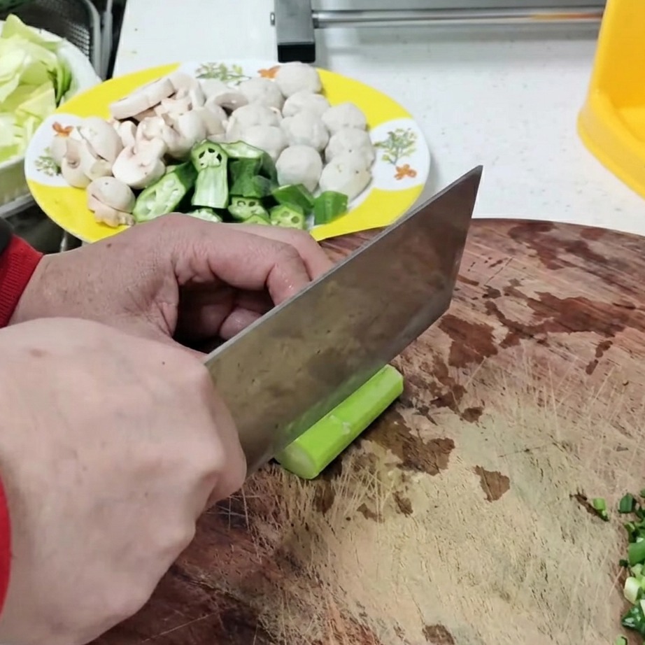 Fresh bamboo shoot slices ready to be added to the soup.