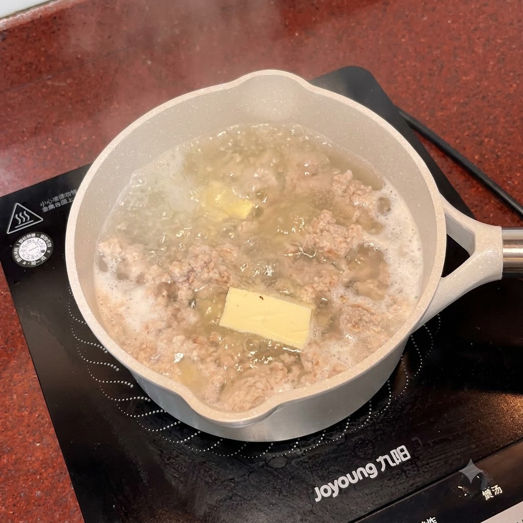 Salt and MSG being added into the simmering soup pot with a small white spoon.