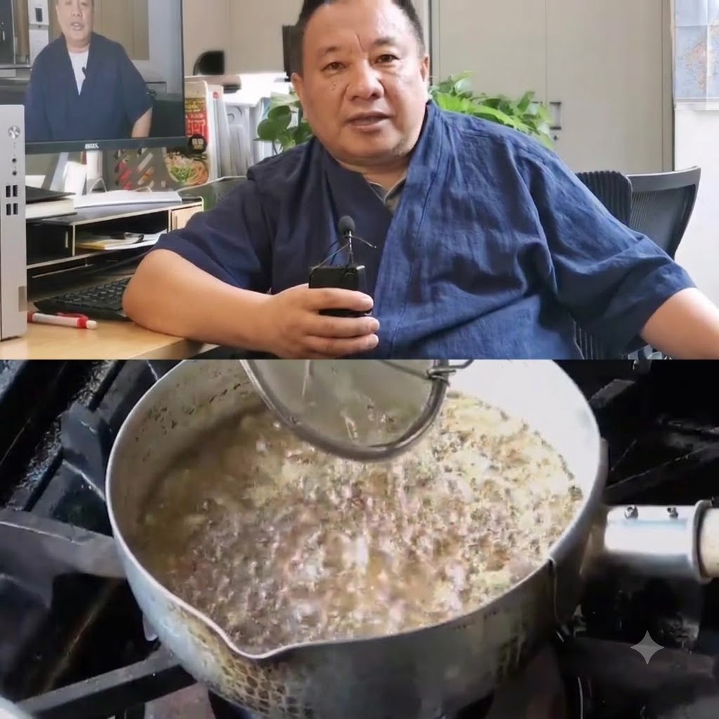 A metal wire strainer scooping out golden yellow garlic slices from hot oil.