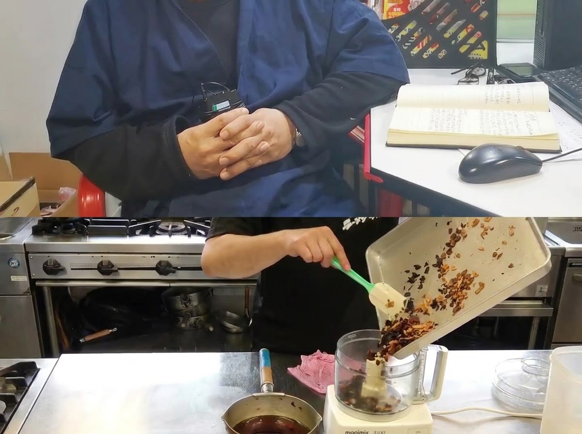 A tray pouring cooled oil and assorted fried garlic slices into a food processor grinder.