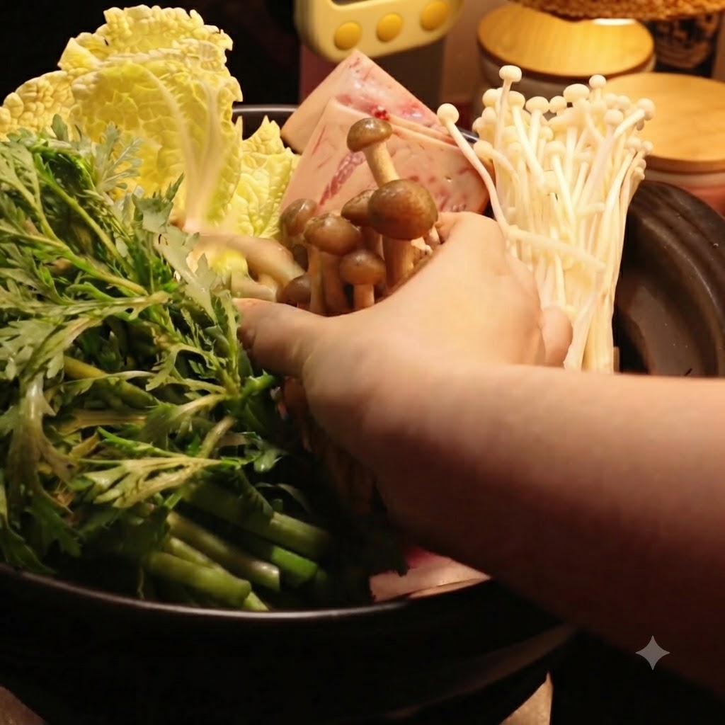 Enoki and shiitake mushrooms being added to the pot alongside the rest of the ingredients.
