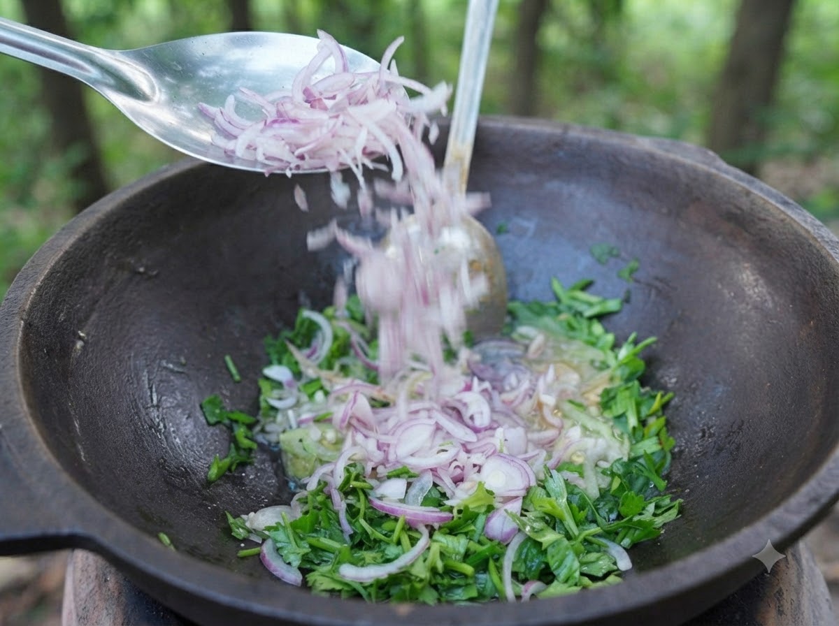 Finely sliced red onions falling from a spoon into a pot containing oil, herbs, and aromatics.