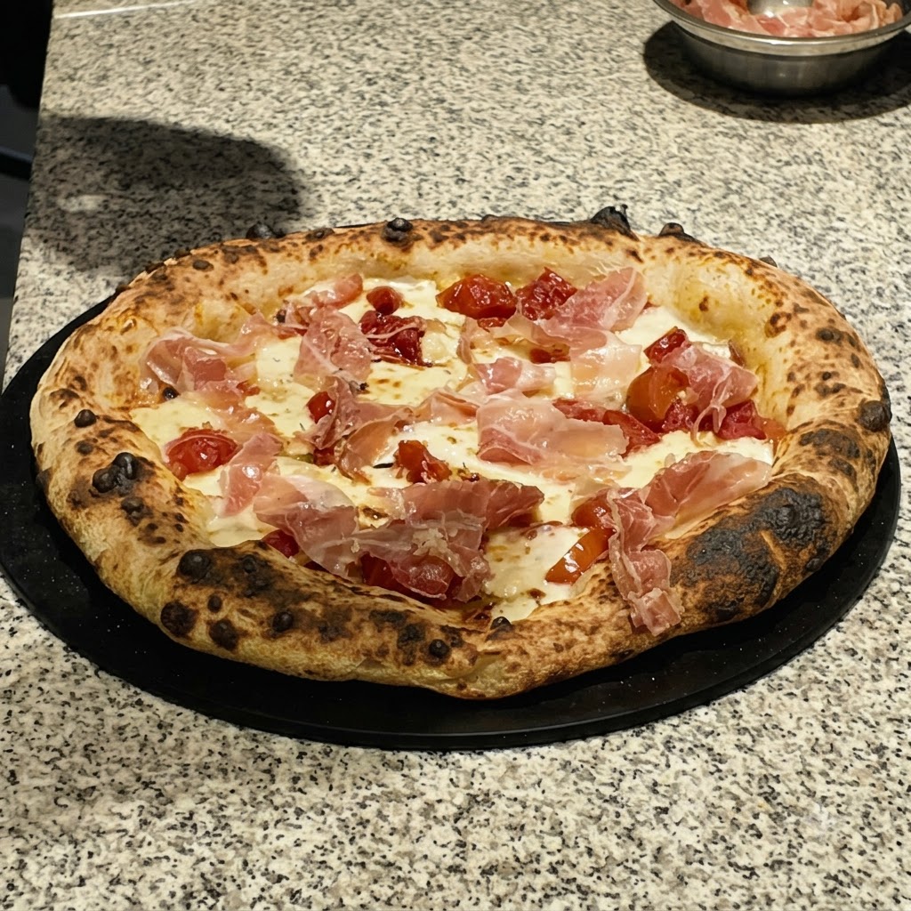 Dried herbs falling from a shaker onto the toppings of an uncooked pizza.
