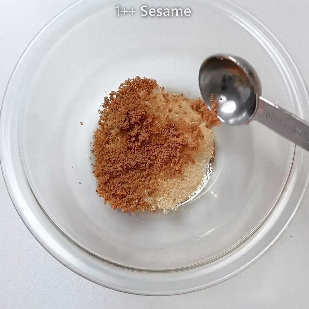 Vinegar being measured and poured into the glass bowl.