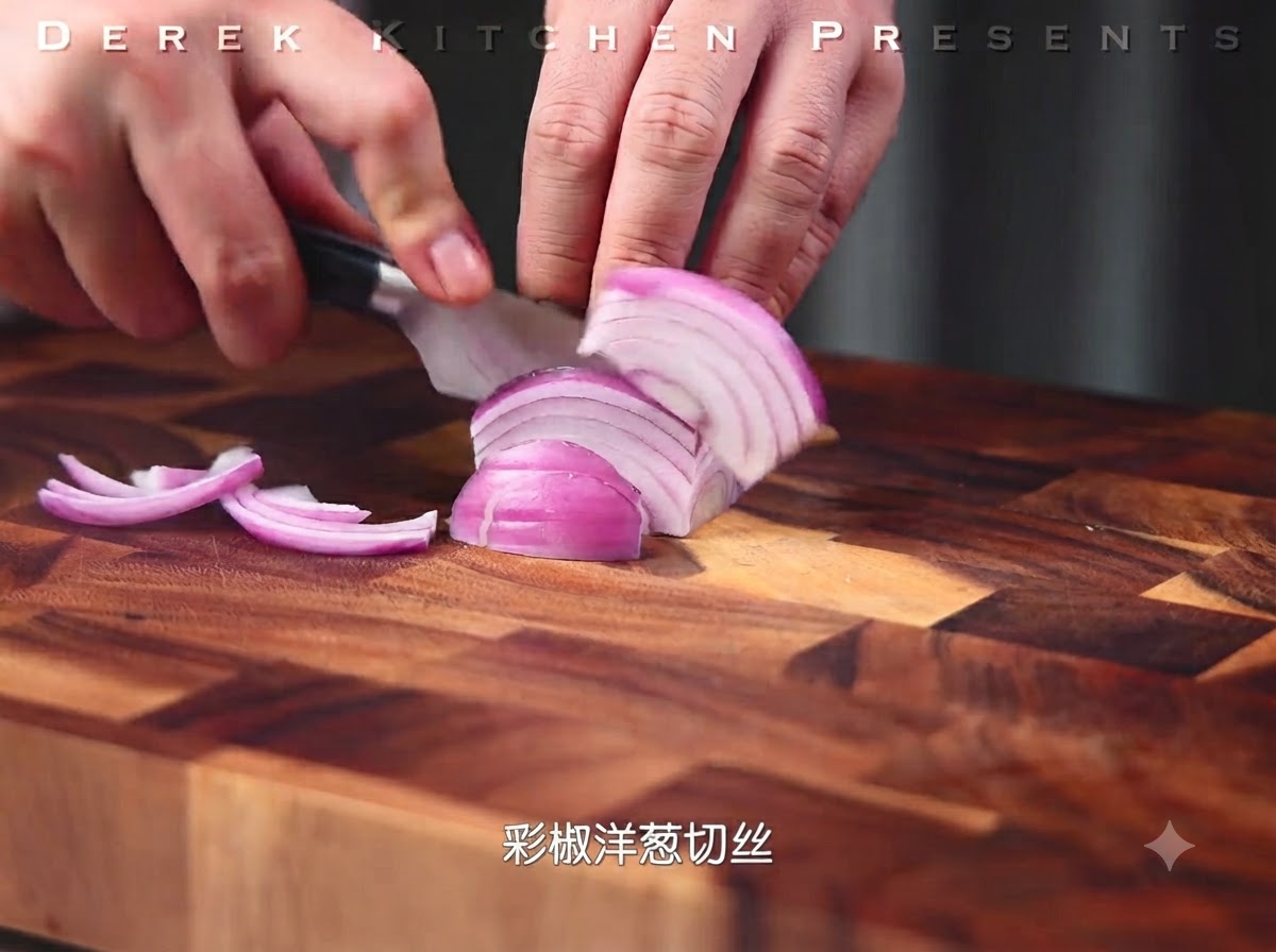White mushrooms being sliced into even pieces with a knife on a wooden cutting board.