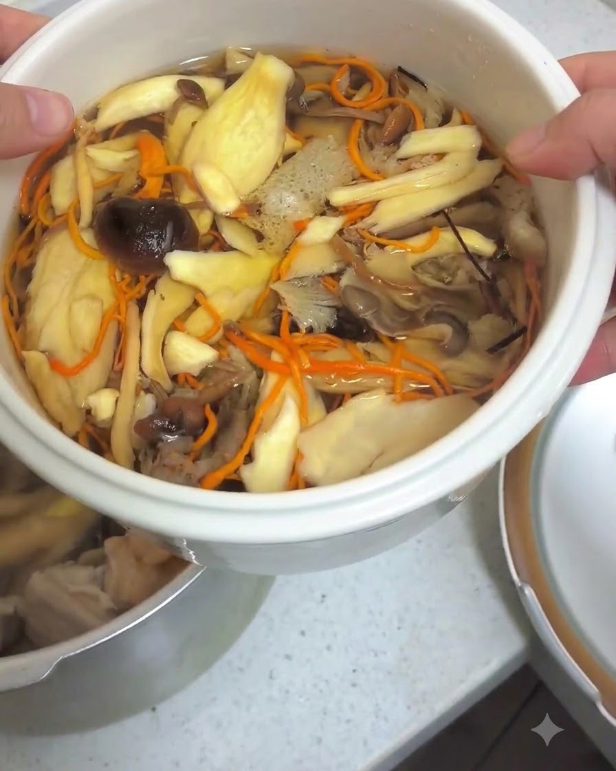 A bowl containing soaked mushrooms and liquid being poured into a pot.