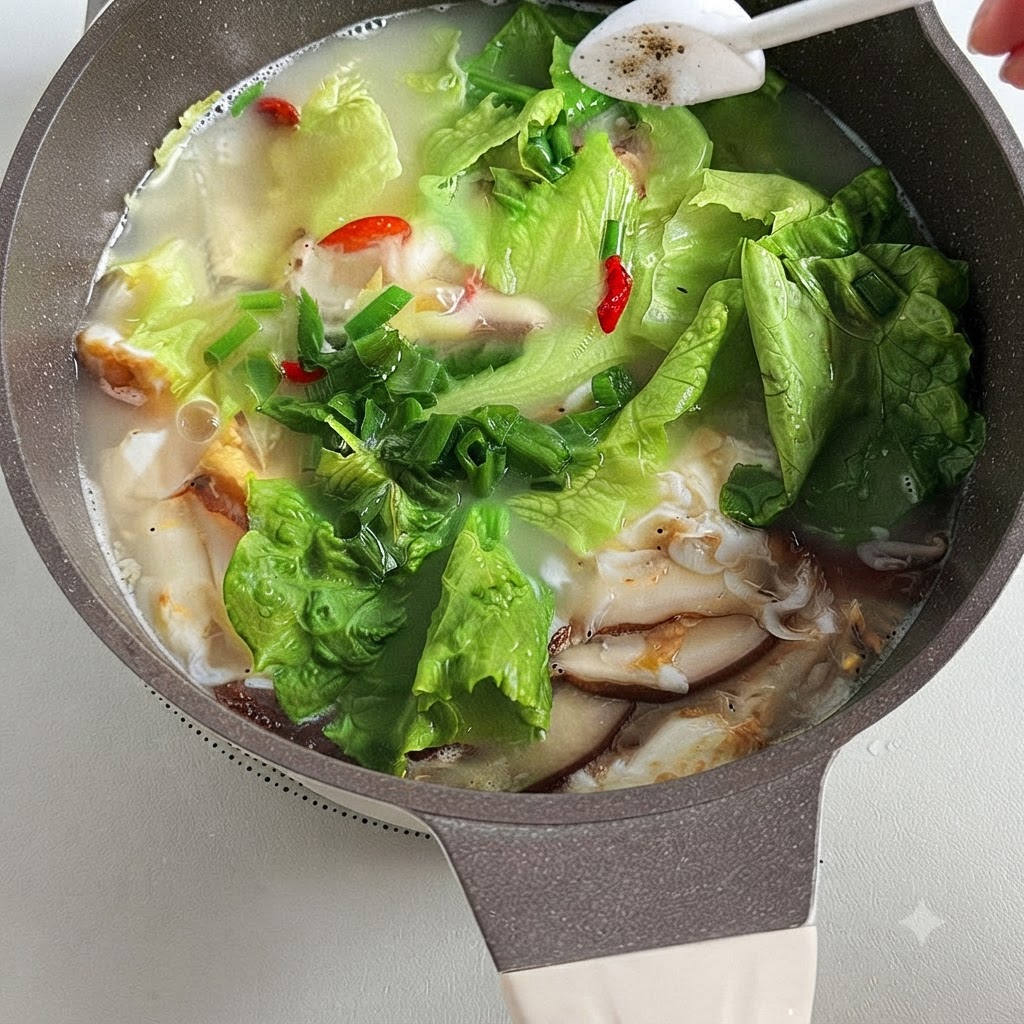 Salt and white pepper being shaken into a pot filled with Sanxian Tofu Soup.
